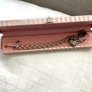 New in box. Juicy couture bracelet with heart charm